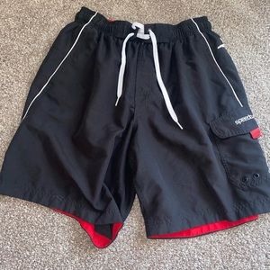 Red and black swim trunks